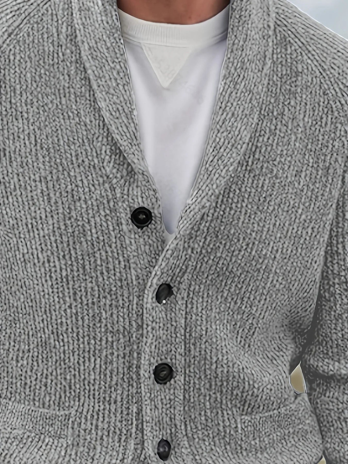 Men's textured knit cardigan with shawl collar, buttons and front pockets