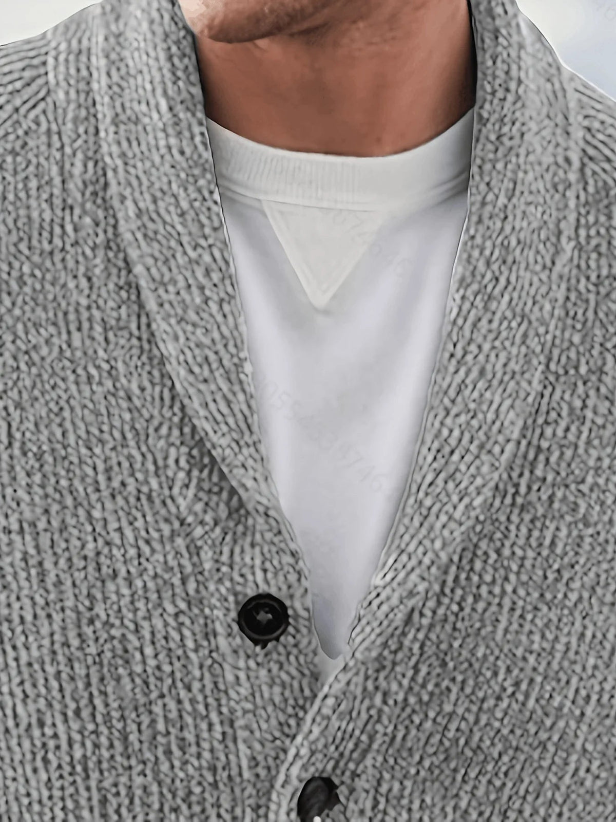 Men's textured knit cardigan with shawl collar, buttons and front pockets