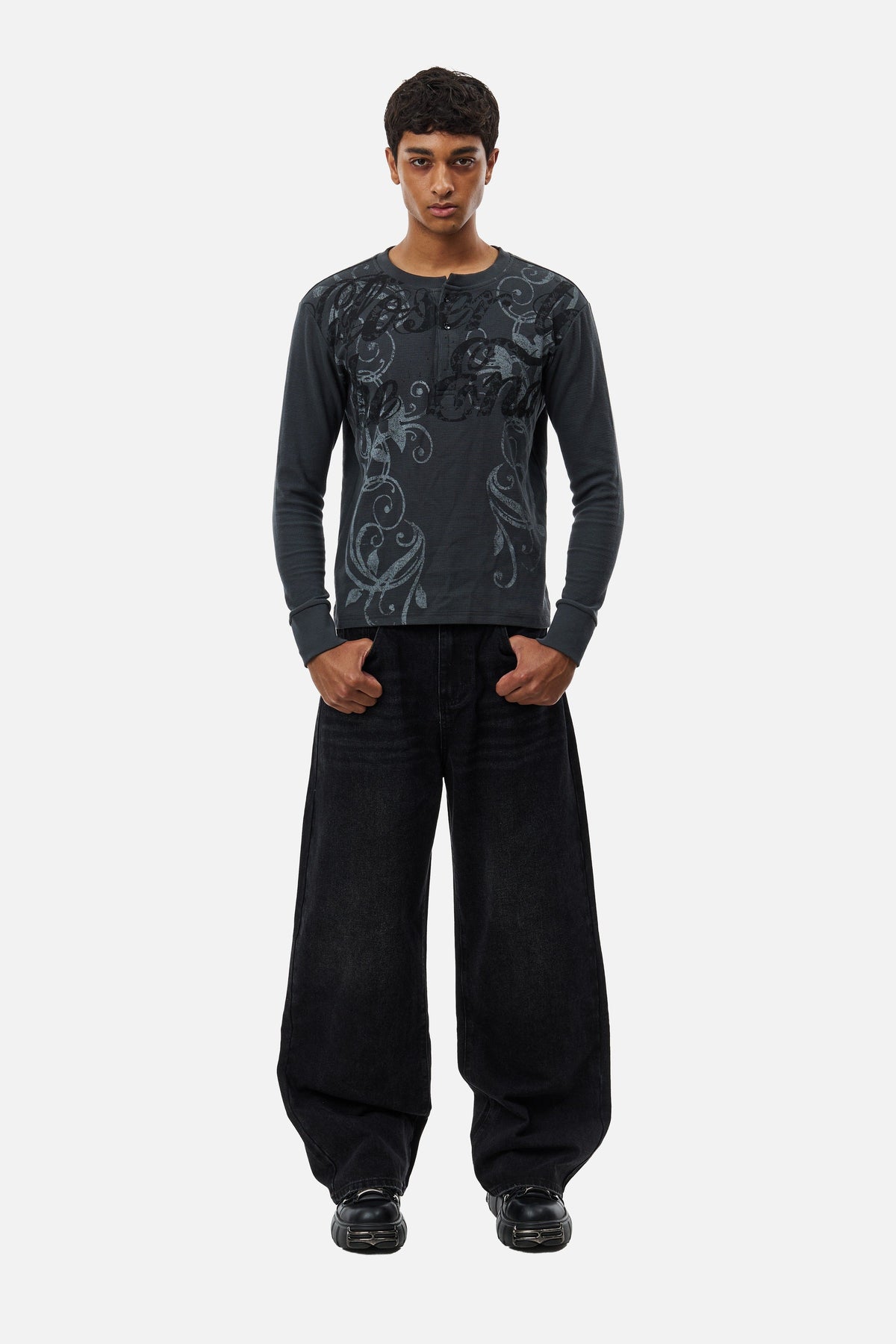 Men's dark grey long-sleeve Henley top with abstract scroll pattern