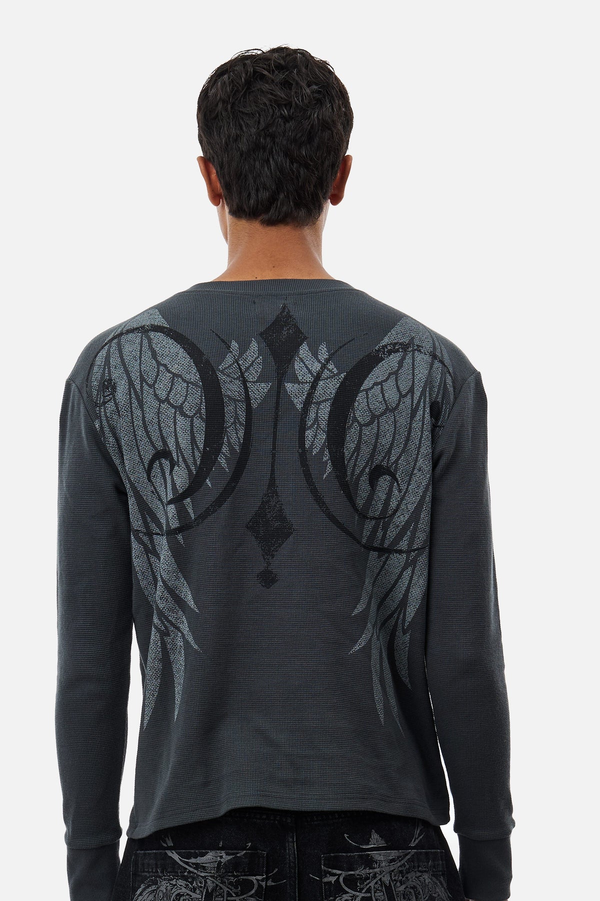 Men's dark grey long-sleeve Henley top with abstract scroll pattern