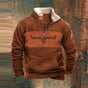 Men's quarter-zip sweatshirt with geometric patterned sleeves and kangaroo pocket