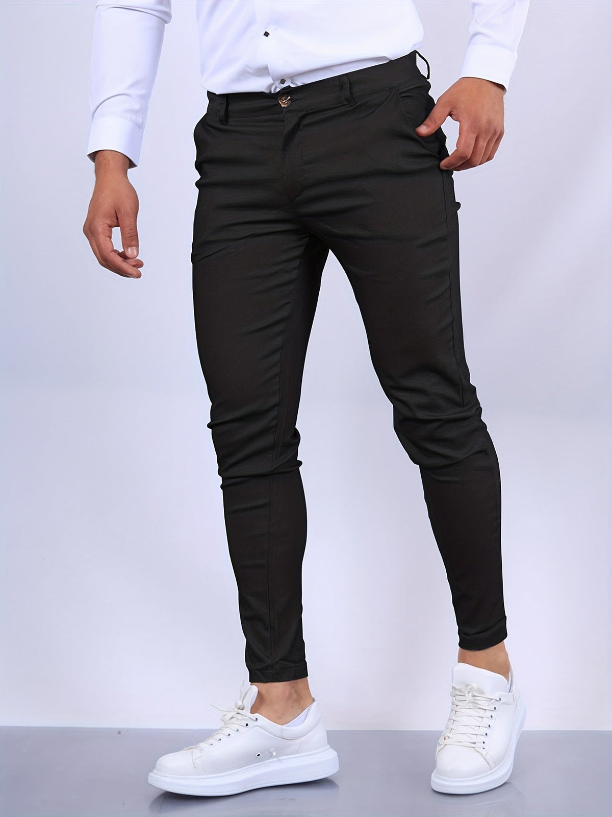 Men's skinny chino trousers with tapered legs and button fastening