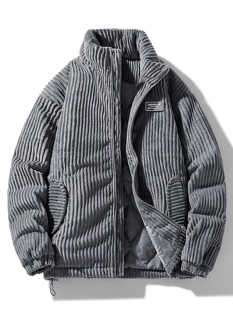 Ribbed padded jacket with high collar, zip front and zipped pockets