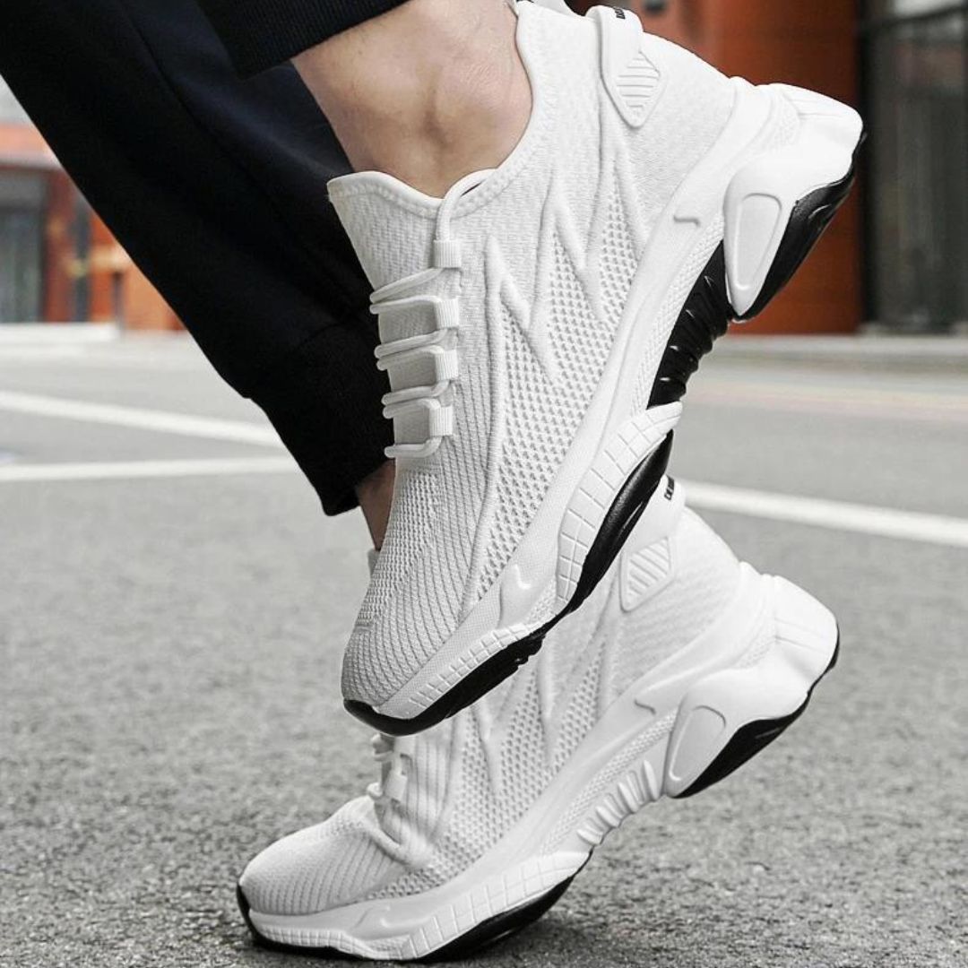 Men's lace-up trainers with a raised sole and panelled upper