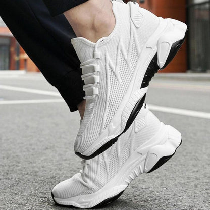 Men's lace-up trainers with a raised sole and panelled upper
