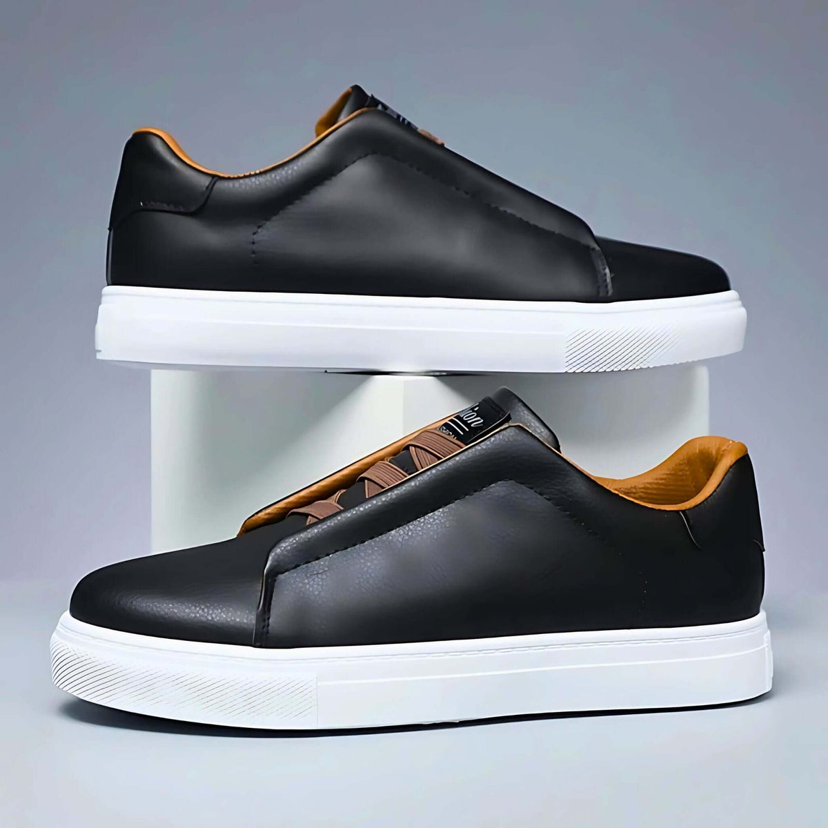 Low-top lace-up sneaker with contrast panelled upper and flat sole