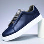 Low-top lace-up sneaker with contrast panelled upper and flat sole