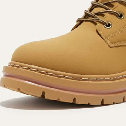 Men's lace-up ankle snow boot with padded collar and lugged sole