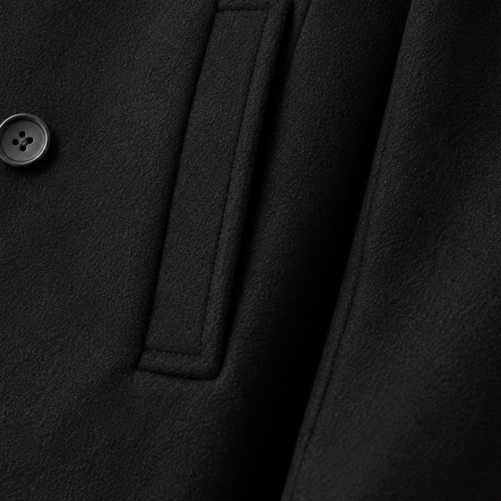 Men's black double-breasted peacoat with notched lapels and long sleeves