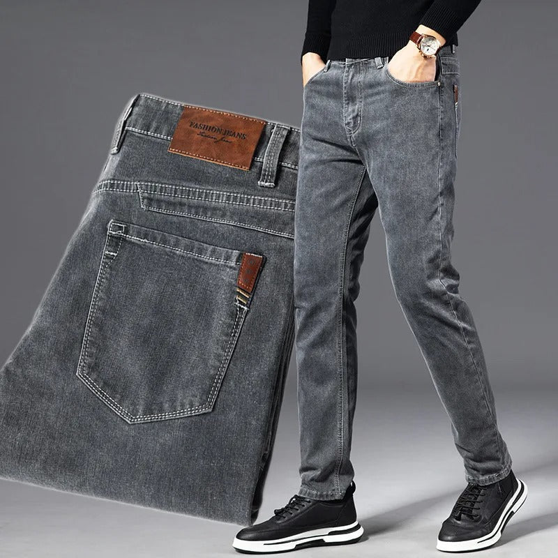 Men's slim straight-leg denim jeans with five-pocket design and belt loops