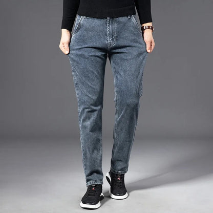 Men's slim straight-leg denim jeans with five-pocket design and belt loops