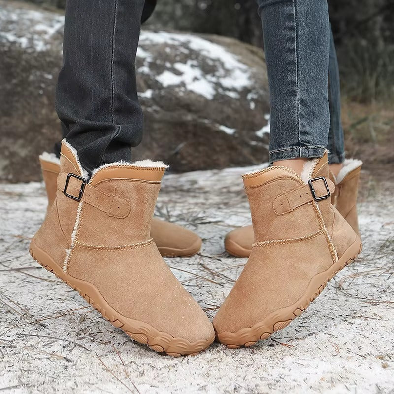Barefoot ankle boots with fur trim, buckle straps and textured flat soles