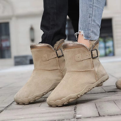 Barefoot ankle boots with fur trim, buckle straps and textured flat soles