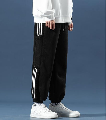 Men's fleece jogger trousers with contrast side stripes and elasticated cuffs