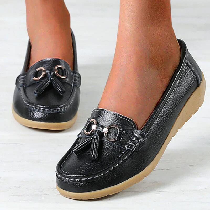 Women's slip-on tassel loafers with round toes, metal ring trims and low textured soles