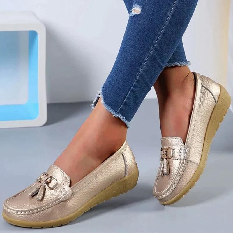 Women's slip-on tassel loafers with round toes, metal ring trims and low textured soles