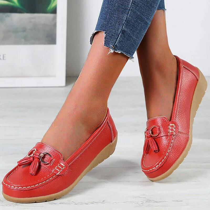 Women's slip-on tassel loafers with round toes, metal ring trims and low textured soles