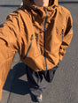 Men's hooded windbreaker jacket with zip front and multiple pockets