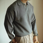 Men's long-sleeve textured polo sweater with collared neckline and ribbed hem