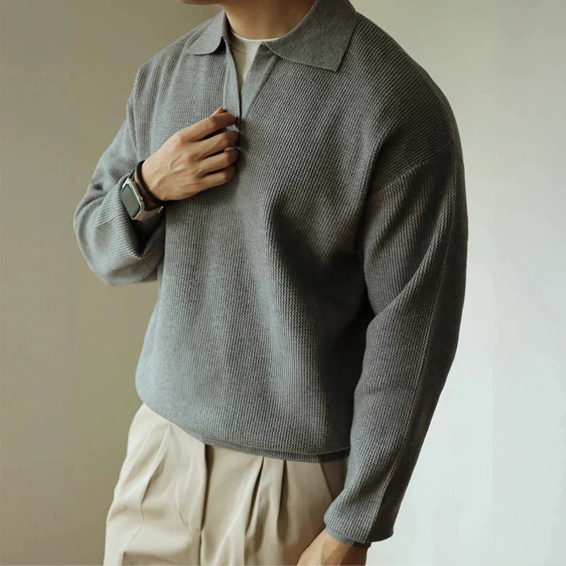 Men's long-sleeve textured polo sweater with collared neckline and ribbed hem