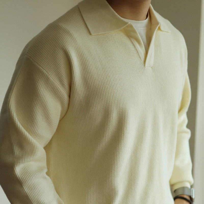 Men's long-sleeve textured polo sweater with collared neckline and ribbed hem