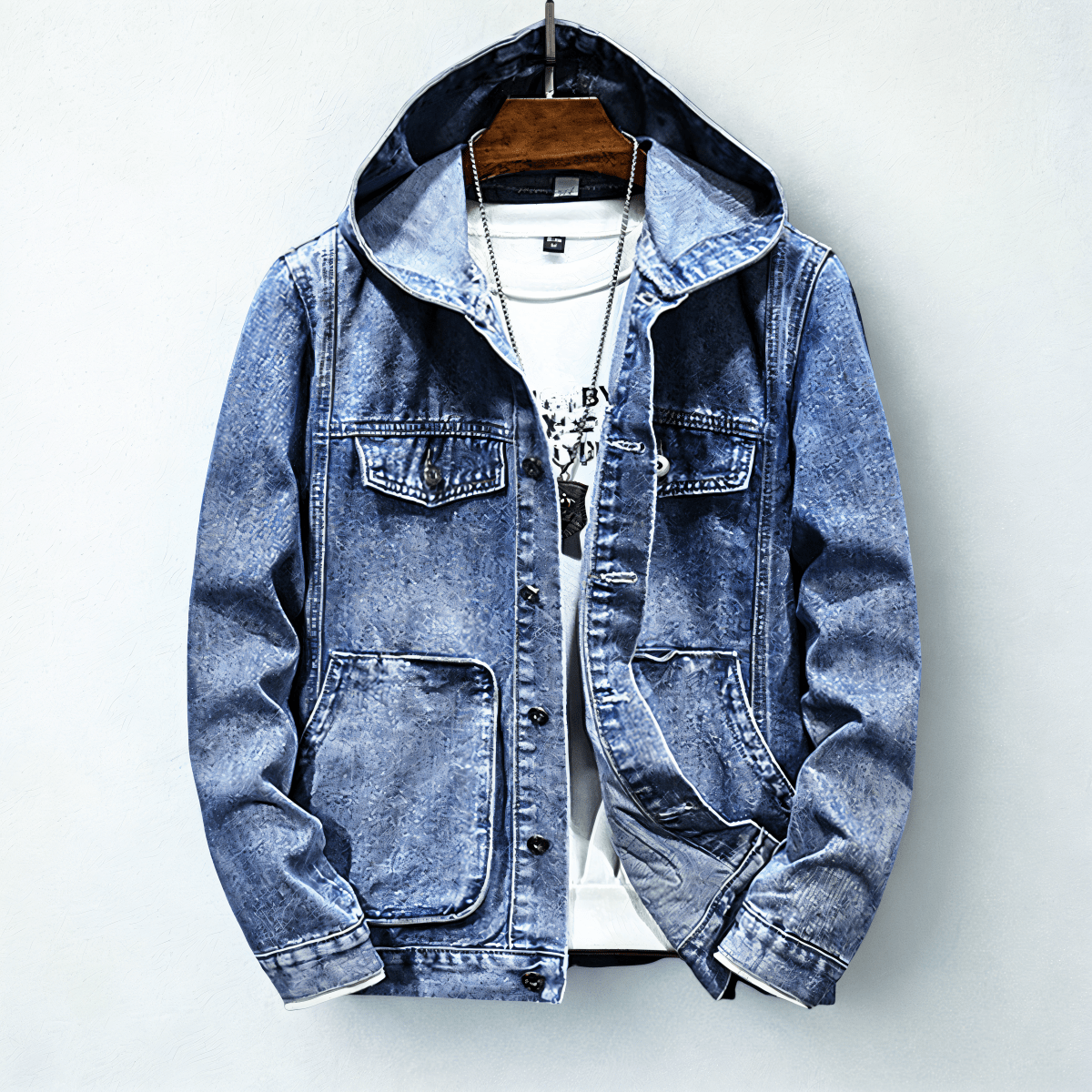 Hooded denim jacket with long sleeves, button front and utility pockets