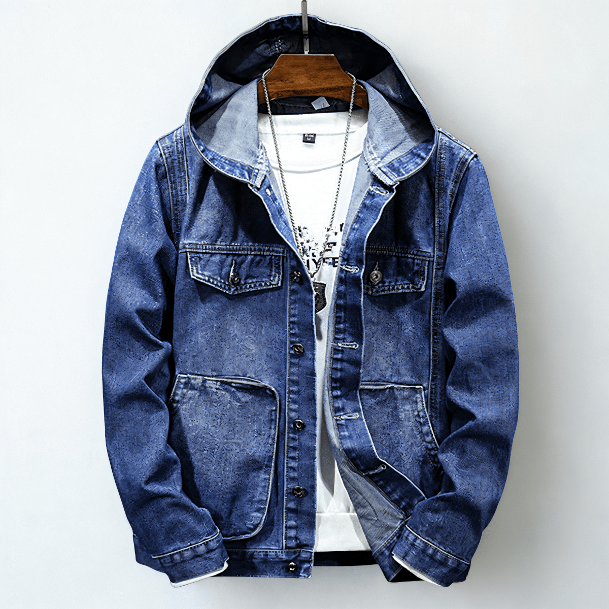 Hooded denim jacket with long sleeves, button front and utility pockets
