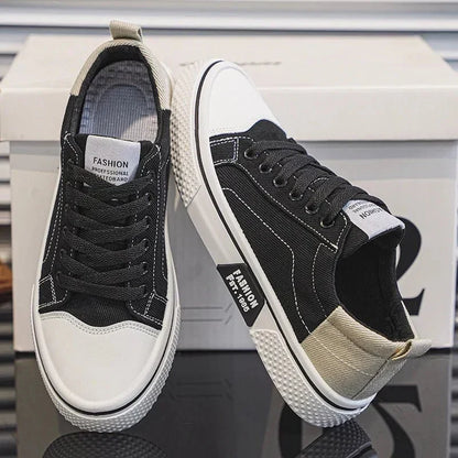 Low top lace-up trainers with panelled uppers, round toes and contrast soles
