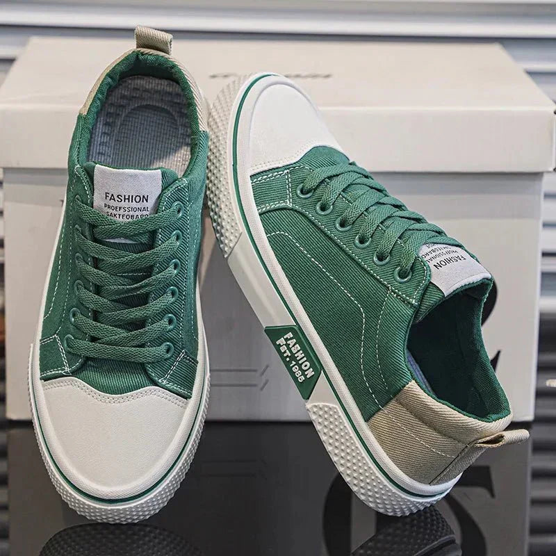 Low top lace-up trainers with panelled uppers, round toes and contrast soles