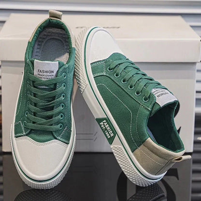 Low top lace-up trainers with panelled uppers, round toes and contrast soles