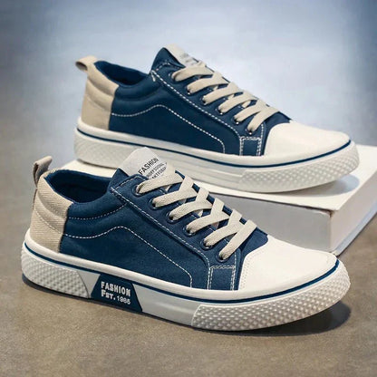 Low top lace-up trainers with panelled uppers, round toes and contrast soles
