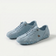 Low-profile lace-up trainers with round toes and textured soles