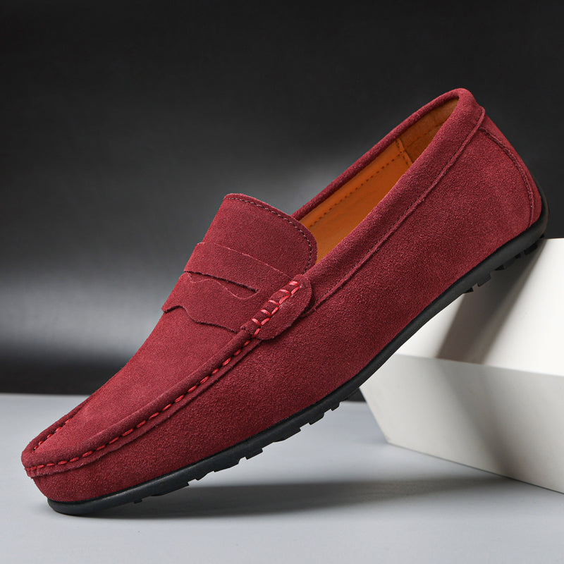 Men's penny loafers with moc toe stitching and slip-on design