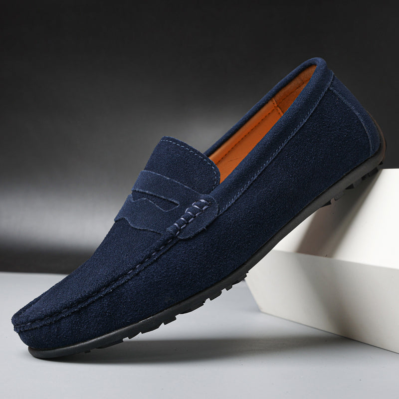 Men's penny loafers with moc toe stitching and slip-on design