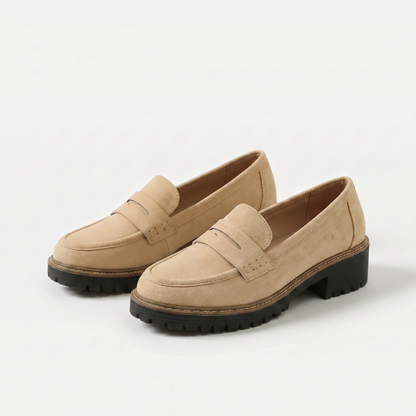 Unisex penny loafers with moc toe and chunky lug sole