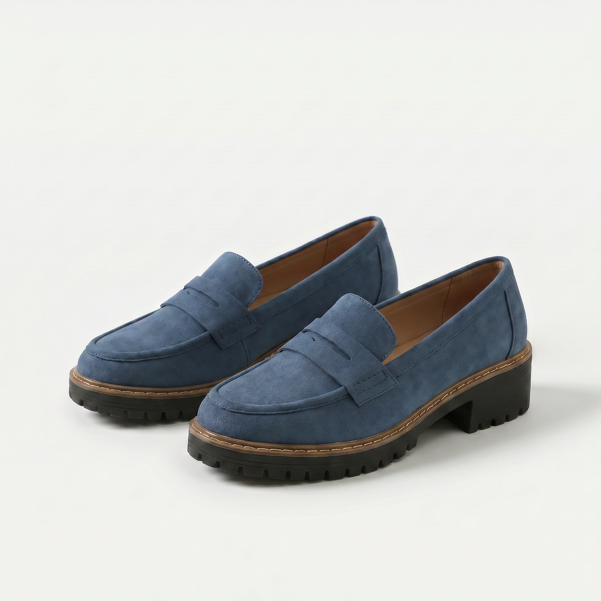 Unisex penny loafers with moc toe and chunky lug sole