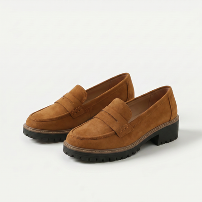 Unisex penny loafers with moc toe and chunky lug sole