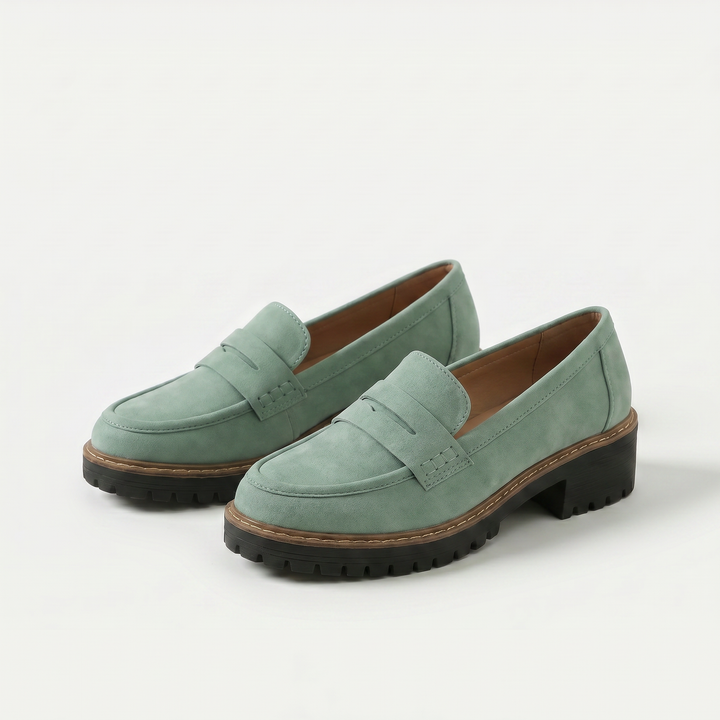 Unisex penny loafers with moc toe and chunky lug sole