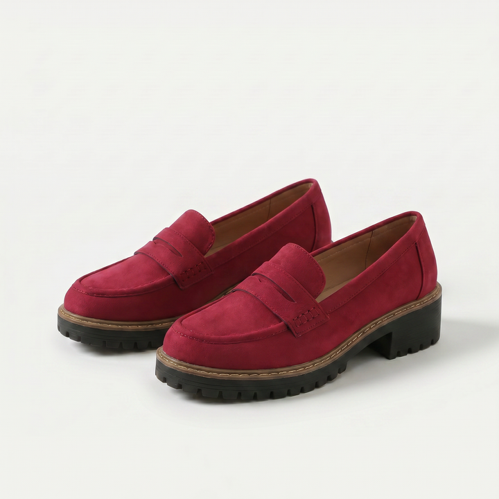 Unisex penny loafers with moc toe and chunky lug sole