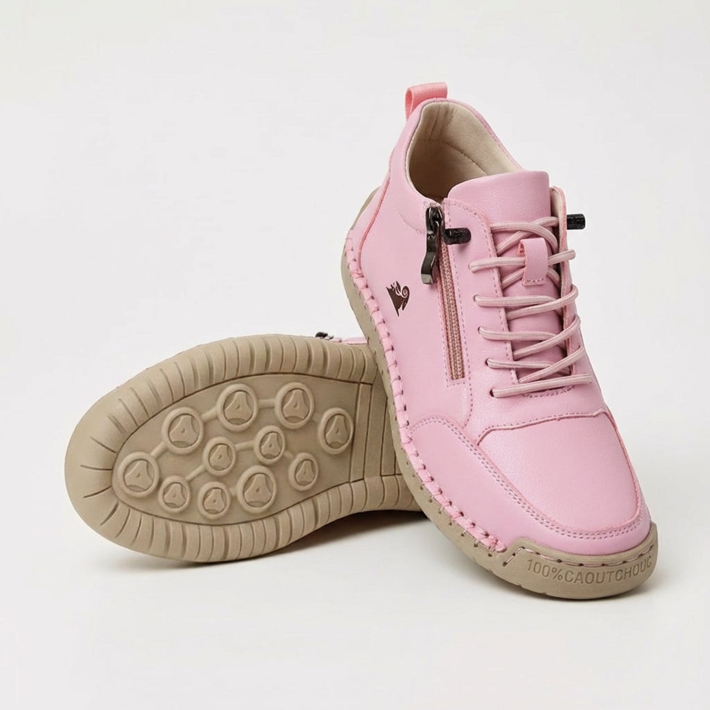 Lace-up ankle sneaker with side zip, shown in tan and pink colorways with padded collar