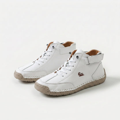 Ankle high lace-up sneakers with stitched panels, ankle strap and contrast sole