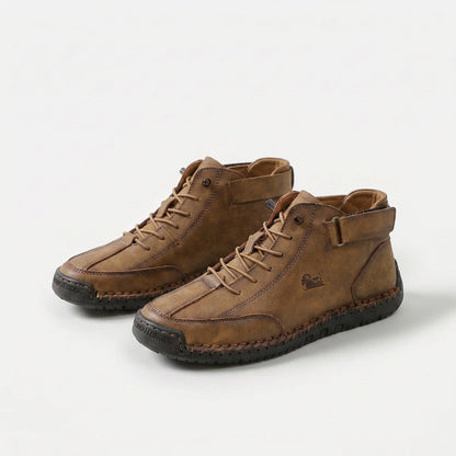 Ankle high lace-up sneakers with stitched panels, ankle strap and contrast sole
