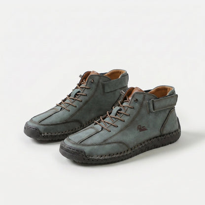 Ankle high lace-up sneakers with stitched panels, ankle strap and contrast sole