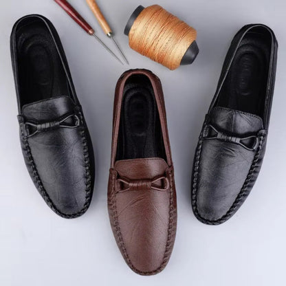 Unisex moccasin loafers with stitched toes and decorative knot detailing