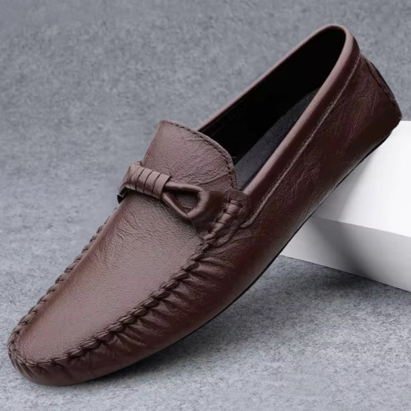 Unisex moccasin loafers with stitched toes and decorative knot detailing