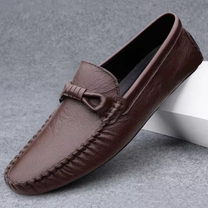 Unisex moccasin loafers with stitched toes and decorative knot detailing