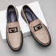 Textured slip-on loafers with geometric front trim and stitched toe detailing
