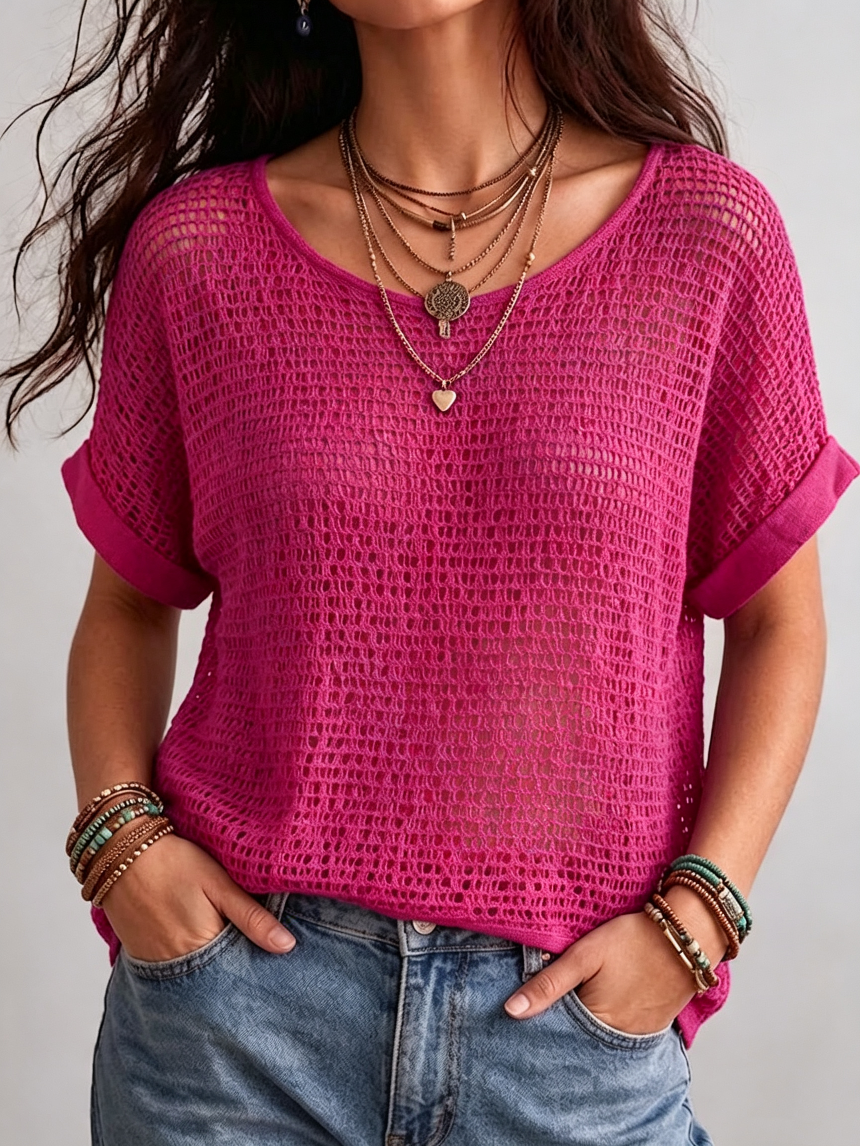 Women's round neck knit top with hollow grid texture and rolled short sleeves in blue and white