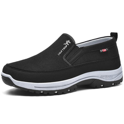 Men's slip-on walking shoe with textured upper, layered sole and treaded outsole