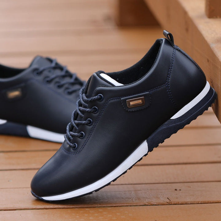 Men's low-top lace-up trainers with rounded toes, layered soles and textured outsoles